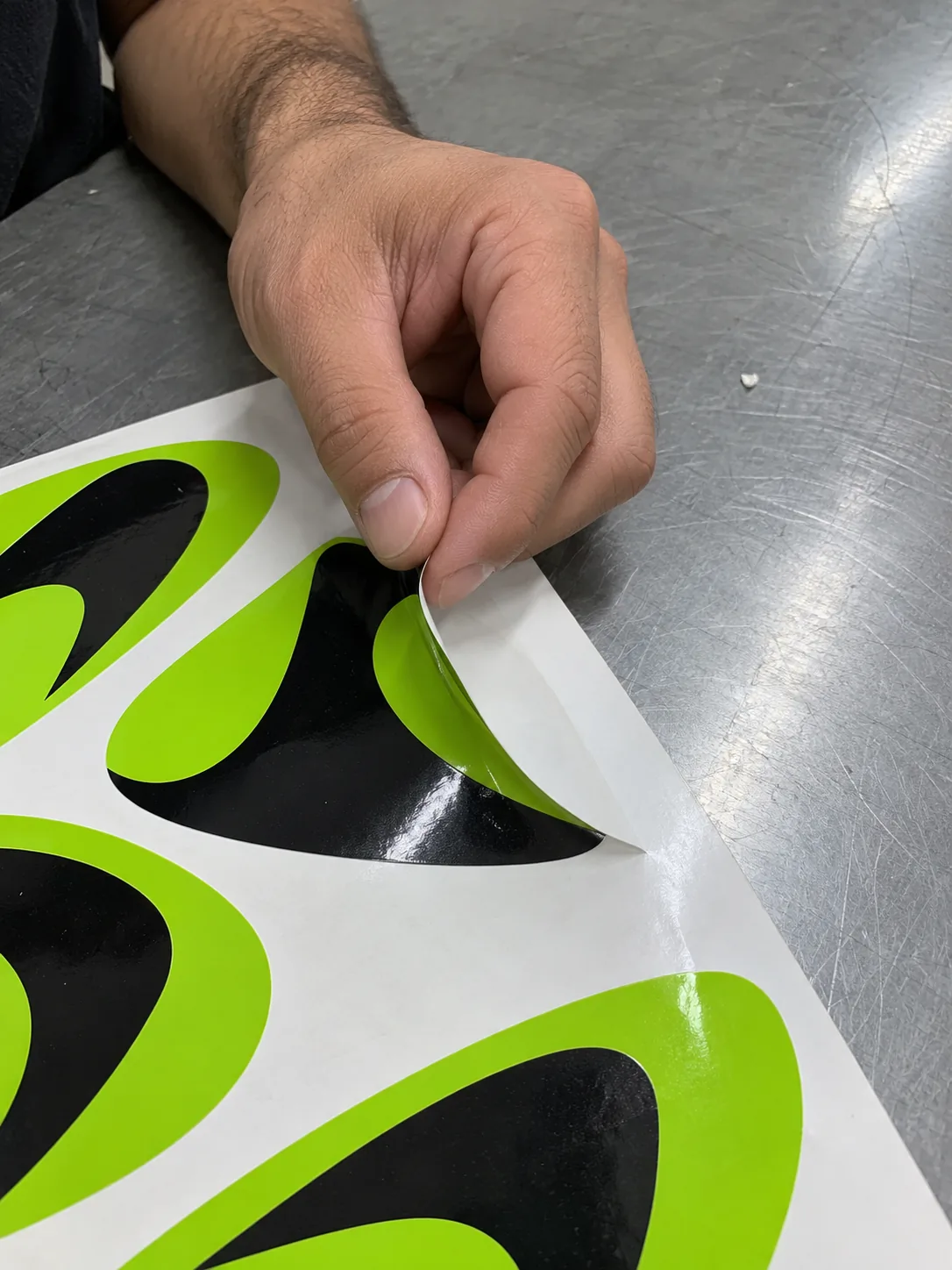 Peeling a die-cut sticker